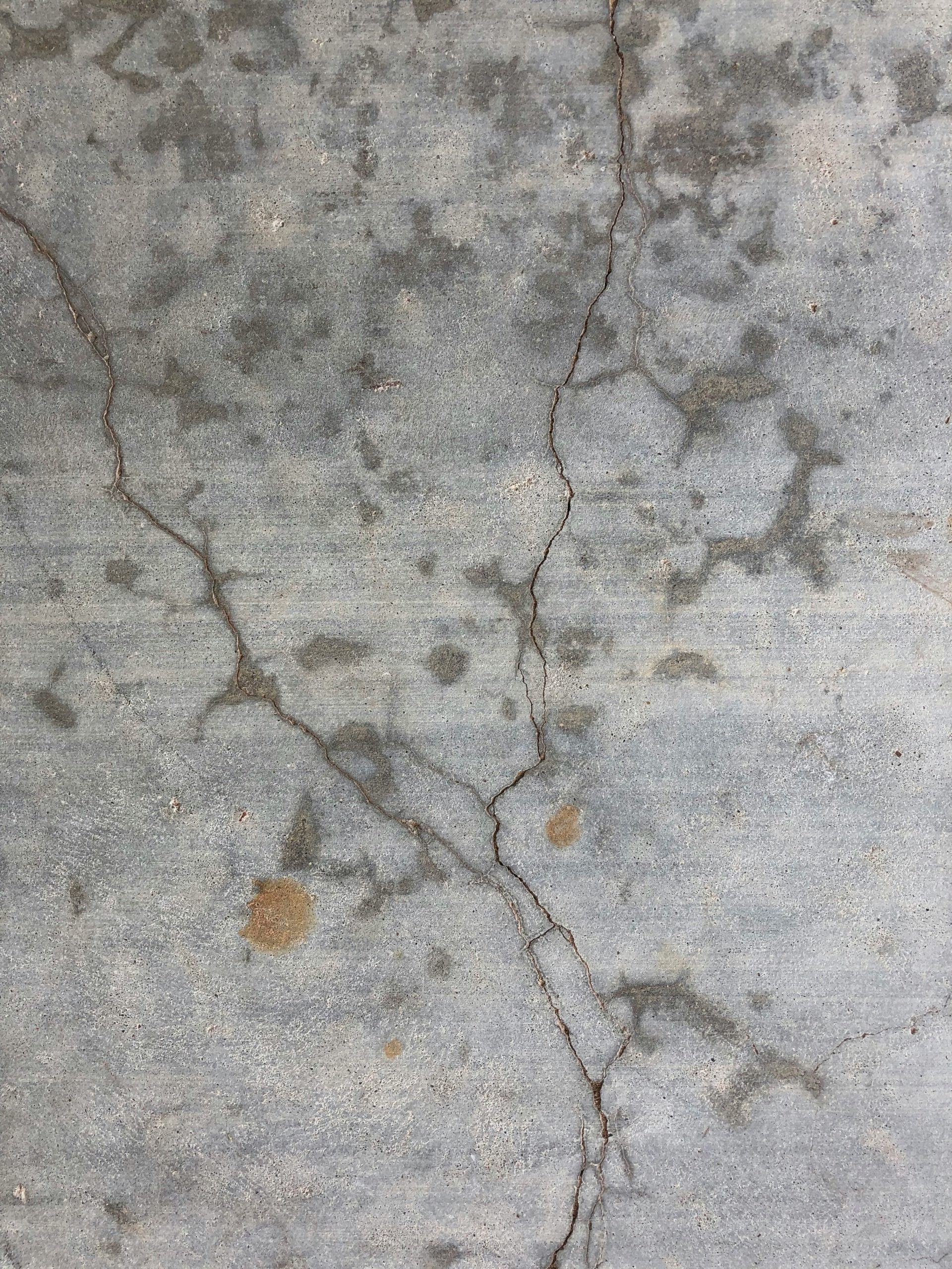 Close-up of a cracked concrete foundation wall, Calgary structural engineering warning sign