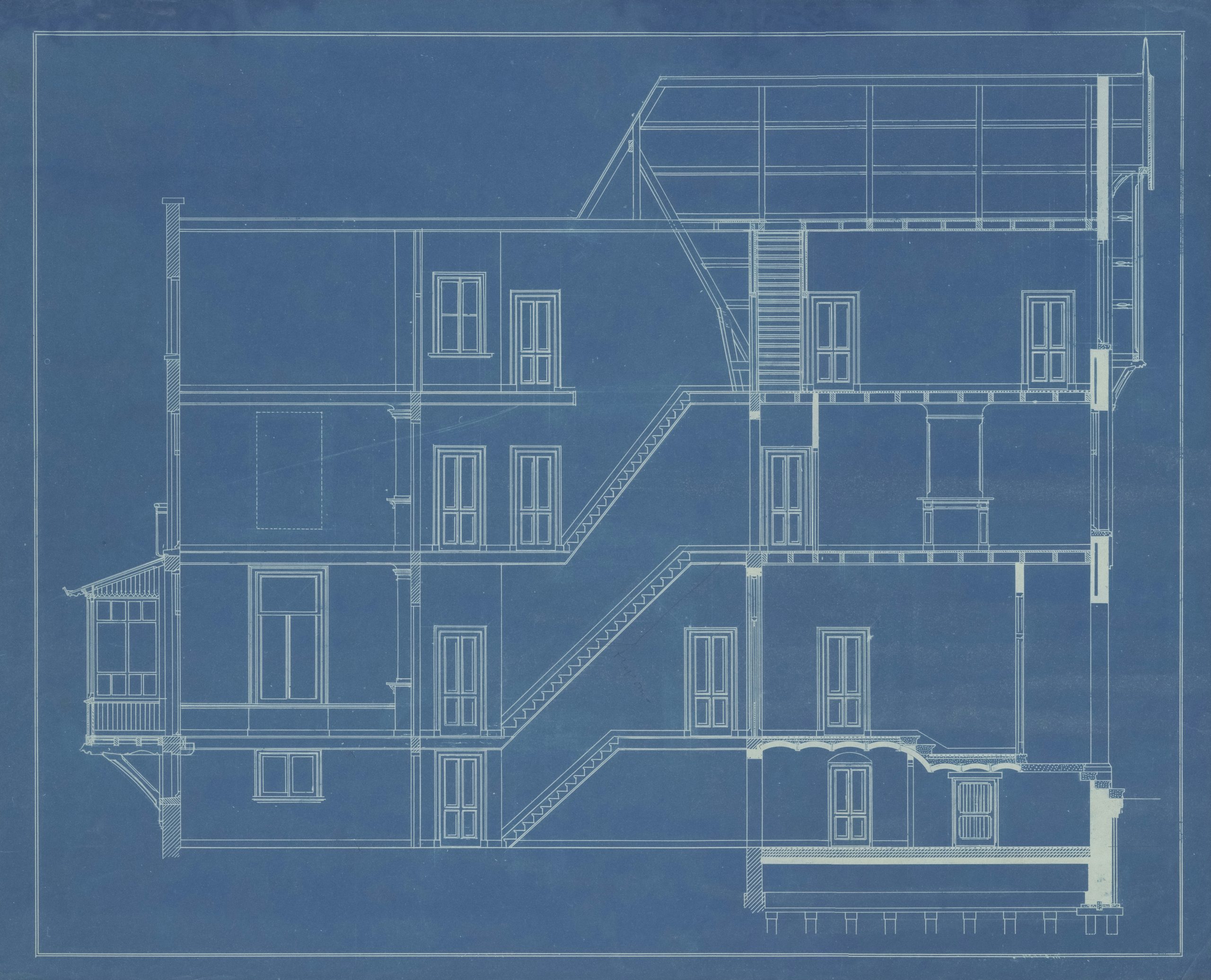 Detailed architectural blueprint of a multi-story building, structural engineering permit drawing